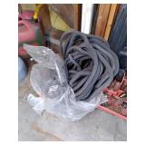 2 saw horses, bin of tools, and emp...