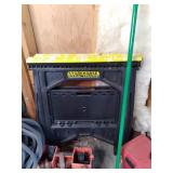 2 saw horses, bin of tools, and emp...