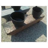 3 Benches with attached plastic pots.