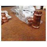 NIBCO & Apollo PressSystem Copper Fittings - (13) 1-1/4" x 1/2" Couplers, (2) 1-1/4" x 1" Couplers, (7) 1-1/4" x 3/4" Couplers, (5) 1-1/4" x 1-1/4" x 1/2" Reducing Tees
