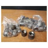 Lot of (35) Steel Pipe Fittings - (15) 1-1/2" Plugs, (20) 1-1/2" Couplers