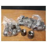 Lot of (35) Steel Pipe Fittings - (15) 1-1/2" Plugs, (20) 1-1/2" Couplers