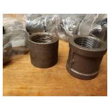 Lot of (35) Steel Pipe Fittings - (15) 1-1/2" Plugs, (20) 1-1/2" Couplers