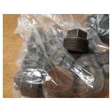 Lot of (35) Steel Pipe Fittings - (15) 1-1/2" Plugs, (20) 1-1/2" Couplers