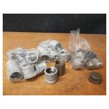 Lot of (41) Steel Pipe Fittings - (12) 1-1/2" Caps, (2) 1-1/2" Plugs, (27) 1-1/2" Couplers
