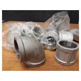 Lot of (23) Steel Pipe Fittings - (7) 2" Couplers, (5) 2" 45° Street Elbows, (5) 2" 90° Elbows, (6) 2" 45° Elbows