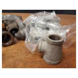 Lot of (50) Steel Pipe Fittings - (24) 1-1/4" x 1/2" Reducers, (9) 1-1/4" x 1" x 3/4" Reducing Tees, (17) 1-1/4" Couplers