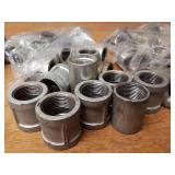 Lot of (61) Steel Pipe Fittings - (23) 1" 45° Street Elbows, (24) 1" Couplers, (14) 1-1/4" x 1/2" Reducing Couplers