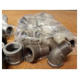 Lot of (61) Steel Pipe Fittings - (23) 1" 45° Street Elbows, (24) 1" Couplers, (14) 1-1/4" x 1/2" Reducing Couplers