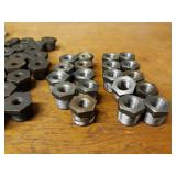 Lot of (89) Steel Pipe Fittings - (20) 3/4" 45° Elbows, (21) 3/4" 45° Street Elbows, (29) 3/4" x 1/8" Bushings, (9) 3/4" x 1/4" Bushings, (10) 3/4" x 1/2" Bushings