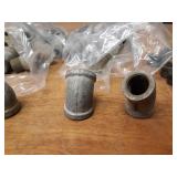 Lot of (89) Steel Pipe Fittings - (20) 3/4" 45° Elbows, (21) 3/4" 45° Street Elbows, (29) 3/4" x 1/8" Bushings, (9) 3/4" x 1/4" Bushings, (10) 3/4" x 1/2" Bushings