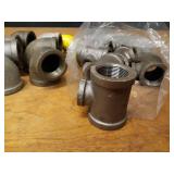 Lot of (35) Steel Pipe Fittings - (9) 1-1/4" x 3/4" x 1-1/4" Tees, (7) 1-1/2" x 1-1/4" 90° Elbows, (9) 1-1/4" 45° Street Elbows, (10) 1-1/4" Bushings