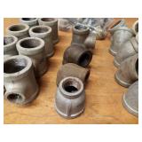 Lot of (38) Steel Pipe Fittings - (8) 1-1/4" x 1/2" x 1-1/4" Tees, (9) 1-1/4" 45° Elbows, (9) 1-1/4" 45° Street Elbows and More