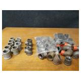Lot of (49) Steel Pipe Fittings - (16) 1-1/4" 45° Elbows, (9) 1-1/4" x 1/2" x 1-1/4" Reducing Tees, (6) 1-1/4" 90° Street Elbows, (15) 1-1/4" Couplers and More