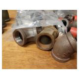 Lot of (49) Steel Pipe Fittings - (16) 1-1/4" 45° Elbows, (9) 1-1/4" x 1/2" x 1-1/4" Reducing Tees, (6) 1-1/4" 90° Street Elbows, (15) 1-1/4" Couplers and More