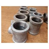 Lot of (49) Steel Pipe Fittings - (16) 1-1/4" 45° Elbows, (9) 1-1/4" x 1/2" x 1-1/4" Reducing Tees, (6) 1-1/4" 90° Street Elbows, (15) 1-1/4" Couplers and More