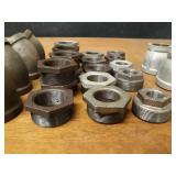Lot of (29) Steel Pipe Fittings - (8) 2" 45° Elbows, (9) 2" x 1-1/2" Bushings, (5) 2" x 1-1/4" Bushings, (4) 2" x 1" Bushings, (1) 2" x 3/4" Bushings, (2) 2" Reducers