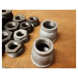 Lot of (29) Steel Pipe Fittings - (8) 2" 45° Elbows, (9) 2" x 1-1/2" Bushings, (5) 2" x 1-1/4" Bushings, (4) 2" x 1" Bushings, (1) 2" x 3/4" Bushings, (2) 2" Reducers