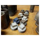 Lot of (35) Steel Pipe Fittings - (12) 2" Plugs, (5) 2" 45° Elbows, (6) 2" x 5-1/2" Nipples, (4) 2" x 4-1/2" Nipples, (2) 2" x 4" Nipples, (3) 2" x 5" Nipples, (2) 2" x 6" Nipples & (1) 2" x 10" Nipp