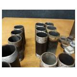 Lot of (35) Steel Pipe Fittings - (12) 2" Plugs, (5) 2" 45° Elbows, (6) 2" x 5-1/2" Nipples, (4) 2" x 4-1/2" Nipples, (2) 2" x 4" Nipples, (3) 2" x 5" Nipples, (2) 2" x 6" Nipples & (1) 2" x 10" Nipp