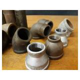 Lot of (19) Steel Pipe Fittings - (7) 2-1/2" 90° Elbows, (1) 2-1/2" 45° Street Elbow, (2) 2-1/2" 90° Street Elbows, (1) 2-1/2" 45° Elbow, (5) 2-1/2"  Nipples, (3) 2-1/2" Reducers
