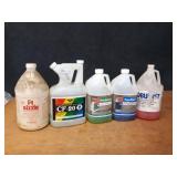 Jugs of Coil Cleaner, Coil Flush, Lime Scale & Rust Remover