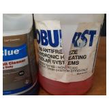 Jugs of Coil Cleaner, Coil Flush, Lime Scale & Rust Remover