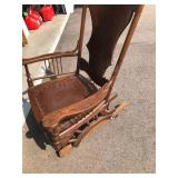 Old Gliding Rocking Chair on Wheels