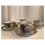 4 Tea cups & Saucers