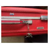 Variety of Suitcases and Travel Bags