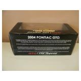 1/18 SCALE DIE-CAST - AMERICAN MUSCLE 2004 PONTIAC GTO. NEW IN BOX. GREAT PIECE - SEE PICTURES.