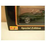 1/18 SCALE DIE-CAST - MAISTO SPECIAL EDITION GREEN 1998 CORVETTE CONVERTIBLE. NEW IN BOX. GREAT PIECE - SEE PICTURES.