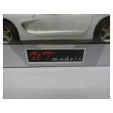1/18 SCALE DIE-CAST - UT MODELS CLASSIC WHITE CORVETTE. NEW IN BOX. GREAT PIECE - SEE PICTURES.