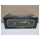 1/18 SCALE DIE-CAST - ROAD ROUGH 1957 CHEVROLET CORVETTE. NEW IN BOX. GREAT PIECE - SEE PICTURES.