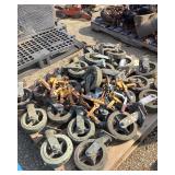Pallet of Wheels and Clamps
