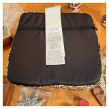 Covered tote containing home decor....