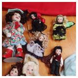 Porcelain Doll Collection in a vari...
