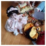 Porcelain Doll Collection in a vari...