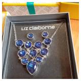 Silver toned necklace and earring s...