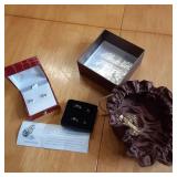 Lot containing earrings. One box is...