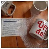 Large lot of ceramic coffee mugs in...