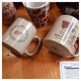 Large lot of ceramic coffee mugs in...