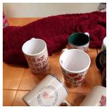 Large lot of ceramic coffee mugs in...