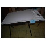 Collapsible craft table with built-...