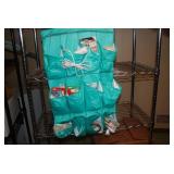 Hanging Door Storage Bin Full of Cr...