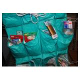 Hanging Door Storage Bin Full of Cr...