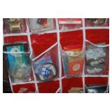 Hanging Door Storage Bin Full of Cr...
