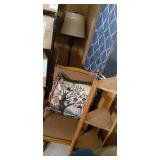 Household Furniture group to include a uniquely crafted 4 tier wood corner shelf/plant stand with a Wood framed and cushioned glider Rocker and decorative display pillow embroidered to show a birdhous