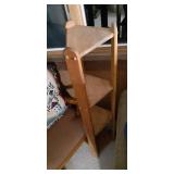 Household Furniture group to include a uniquely crafted 4 tier wood corner shelf/plant stand with a Wood framed and cushioned glider Rocker and decorative display pillow embroidered to show a birdhous
