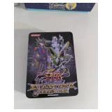 Pictionary, puzzles, Yu-Gi-Oh! storage tin and a handful of Lifegear flashlight/glow stick combos